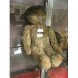 An early 20th century teddy bear CONDITION REPORT: The bear is approximately 45cm