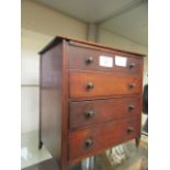 An 18th century style apprentice four drawer chest