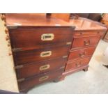 A reproduction campaign style four drawer chest together with a reproduction mahogany chest of
