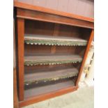 A late Victorian mahogany open bookcase