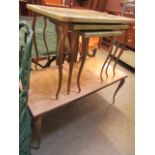 A nest of three onyx effect gilt metal supported occasional tables together with one other similar