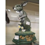 A cast iron doorstop in the form of a hare