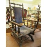 A child's late Victorian walnut American style rocking chair