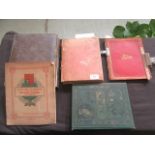 A selection of photograph albums, paper ephemera,