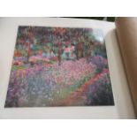 A selection of poster prints celebrating an exhibit of the works of Claude Monet