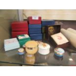 A selection of ceramic and other enamel trinket boxes