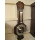 A mid-20th century oak banjo barometer
