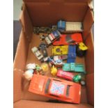 A box containing an assortment of die cast cars, trucks,