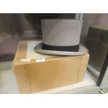 A grey top hat with box