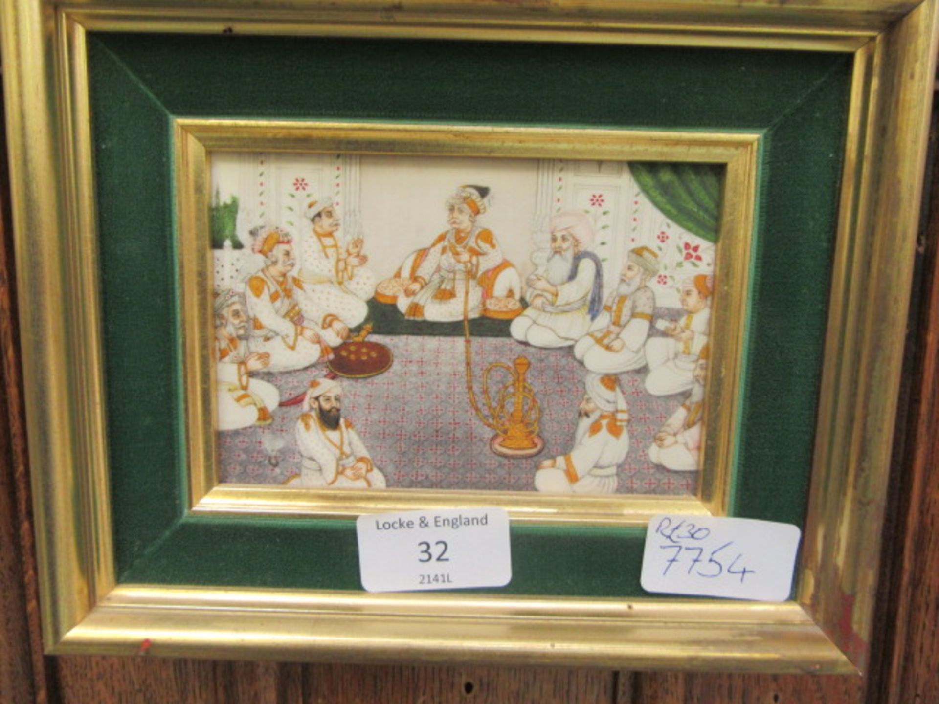 An eastern style framed plaque