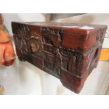 A carved wooden storage box