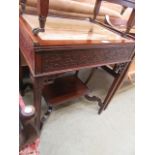 An eastern hardwood glass top cabinet with under tier