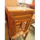 A nest of three oriental style occasional tables