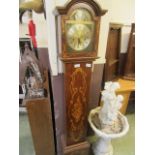 A reproduction inlaid grandmother clock