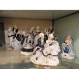 A selection of ceramic continental 18th century style figurines