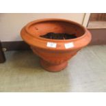 A terra cotta pot