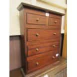A small Victorian mahogany chest of two short over three long drawers