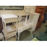 A selection of white painted wicker bedroom furniture comprising two bedside cabinets,