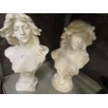 A pair of plaster busts of young ladies