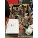 A tray containing a large selection of bird ornaments etc.