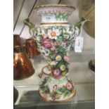A 19th century Spode Felspar porcelain twin handled urn and cover having encrusted floral