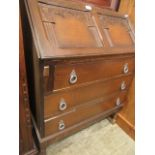 A reproduction oak fall front bureau (A/F)