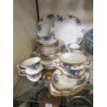 A part Royal Albert dinner set 'Moonlight Rose' comprising of soup bowls, cups, saucers,