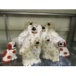 A selection of Staffordshire flatback dogs