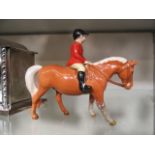 Two Beswick Palomino ponies with jockeys in hunting dress CONDITION REPORT: Front