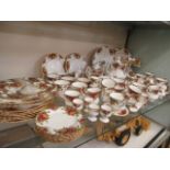 A large collection of Royal Albert 'Old Country Rose' to include cups, saucers, plates, clock,
