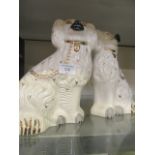 A pair of Royal Doulton ceramic Staffordshire dogs CONDITION REPORT: There is no