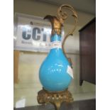 A 19th century blue glass and gilt mounted ewer