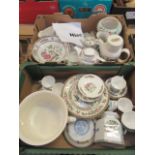 Two trays of Indian Tree table ware to include cups, saucers, coffee and tea pots etc.