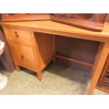 A modern oak desk having two drawers