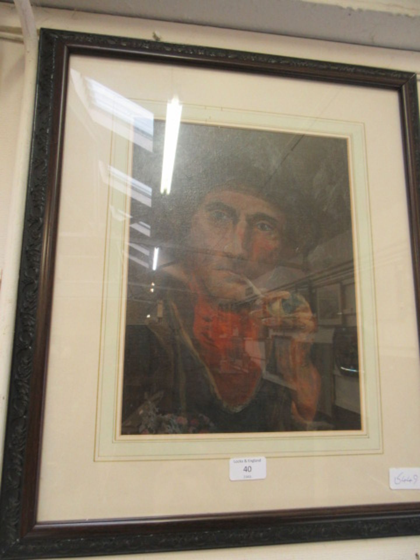 A framed and glazed oelograph of elderly gentleman smoking pipe