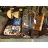 Two trays containing a radio, toy shop tins etc.