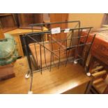 A mid-20th century design wire work magazine rack