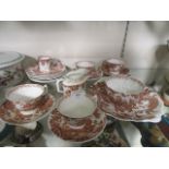 A part Royal Crown Derby tea set with bird design comprising of tea cups, saucers, plates,