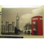 A stretched canvas of London with red phone box