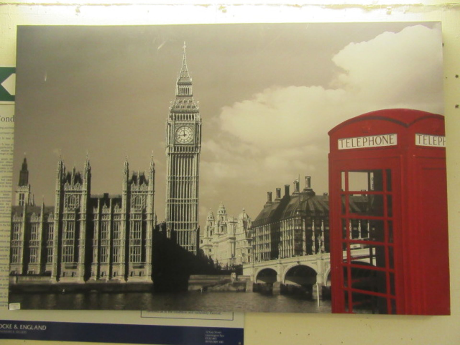 A stretched canvas of London with red phone box