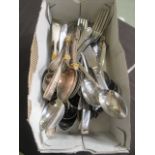 A box containing an assortment of modern flatware