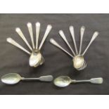 A bag containing a quantity of silver hallmarked spoons, including two non hallmarked spoons,