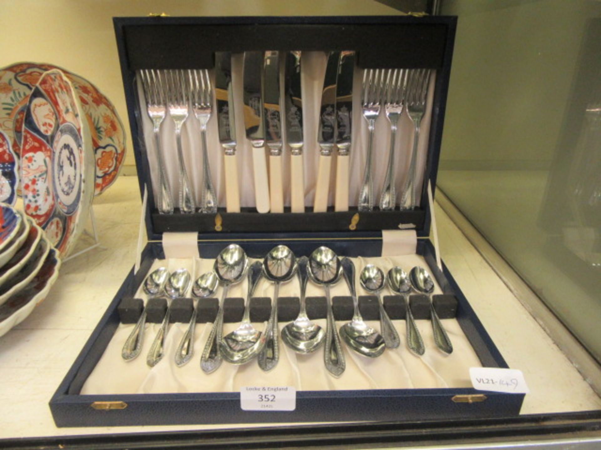 A cased set of chrome plate flatware