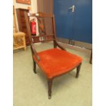 An Edwardian mahogany and inlaid bedroom chair