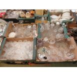 Four trays of glassware to include decanters, vases, drinking vessels,