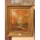 A framed oil on board of river through wood scene