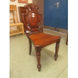 A Victorian mahogany shield back hall chair