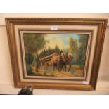A modern gilt framed oil of horses in wooded scene
