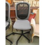 A grey and black typist chair