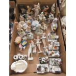 A tray containing a large quantity of continental style ceramic figurines